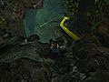 4. On the right wall are a couple of wooden platforms with an Ooze, which lead to broken stairs going down. Take the stairs down.