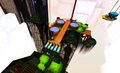 Jump on the sides of the fish pools to avoid the center spear trap.