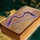 The Art of Tanning- Short Bow String Edition.png