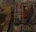 Going behind the stairs to climb up the far side of them.