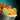 Bowl of Fruit Salad with Orange-Clove Syrup
