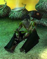 Mender Serimon sitting with hammer